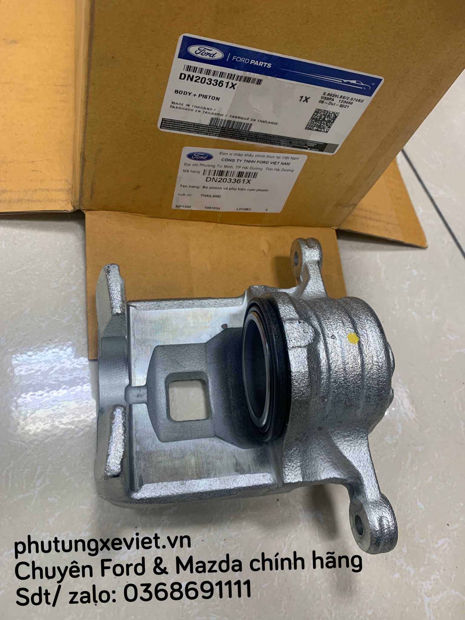 Cụm caliper piston phanh trước Fiesta DN203361X DN203371X AV592B302AA