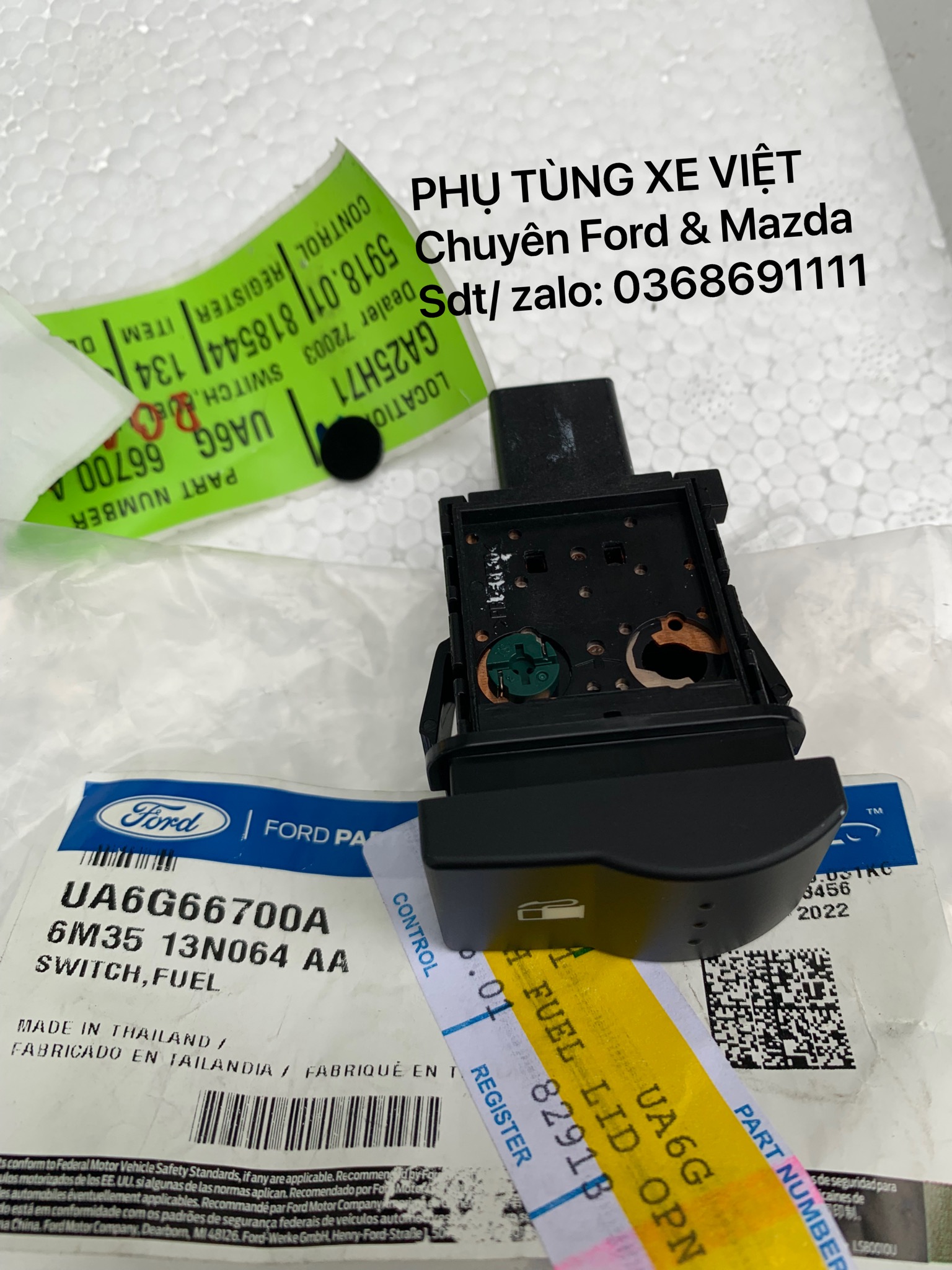 Công tắc mở nắp bình nhiên liệu Everest UA6G66700A 6M3513N064AA