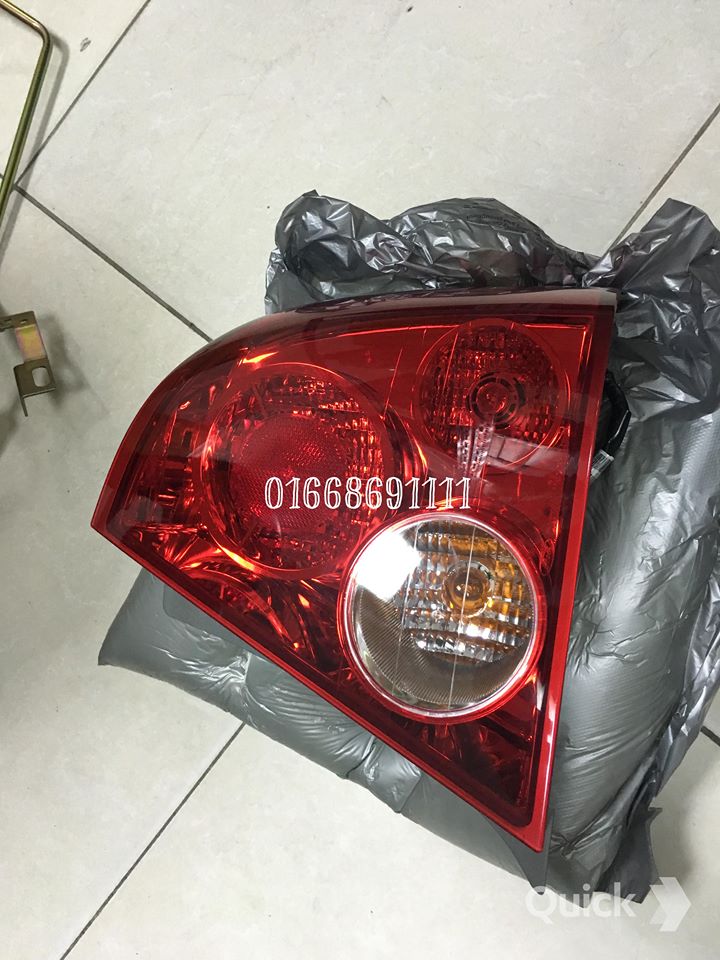 Đèn hậu xe Ford Laser chính hãng – YB25D X51150 MB / YB25D X51160 MB